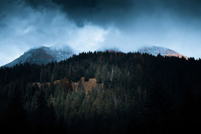 Cinematic view of clouds in mountains dark and dramatic landscape