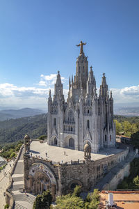 Panoramic view of cathedral and buildings against sky