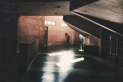 Full length of woman walking on steps