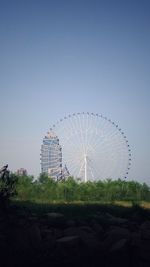 Ferris wheel against clear sky