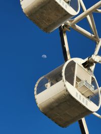 Low angle view of balloon against blue sky