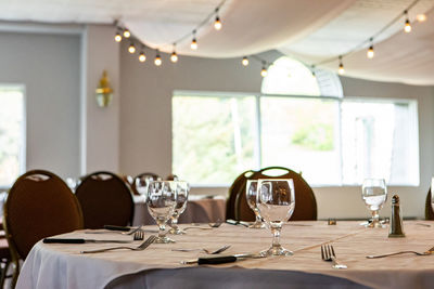 Empty chairs and table in restaurant