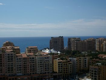 View of cityscape with sea in background