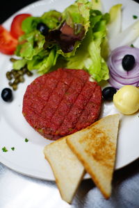 Close-up of served food in plate