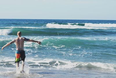 Tourists enjoying at sea shore