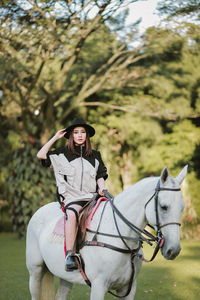 Woman riding horse