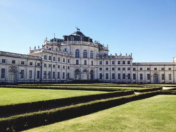 Lawn in front of built structure