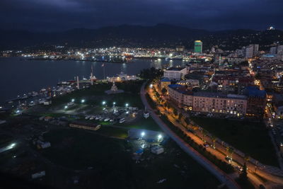 High angle view of illuminated city at night