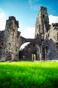 Low angle view of old ruins against clear sky