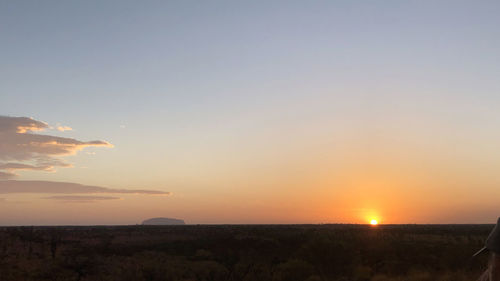 Scenic view of silhouette landscape against sky during sunset