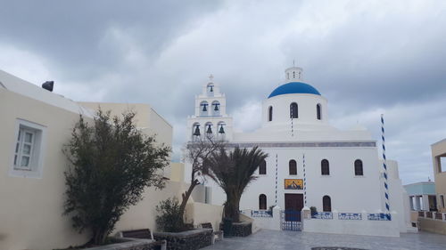 Panoramic view of cathedral and buildings against sky