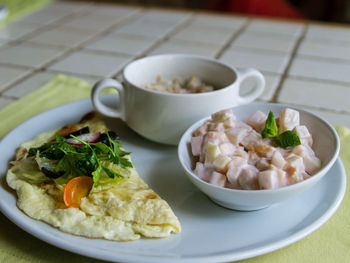 Close-up of breakfast served on table