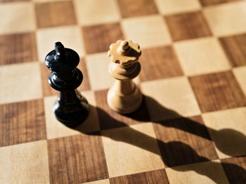 High angle view of chess pieces on floor