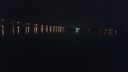 Reflection of illuminated buildings in water