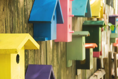 Close-up of colorful objects against the sky