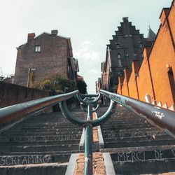 Low angle view of buildings against sky in city