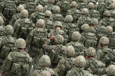 Rear view of army soldiers at parade