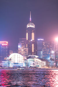 Illuminated buildings in city at night