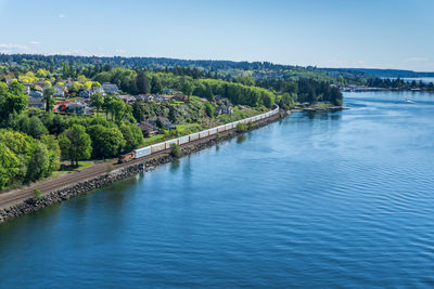 Railroad train along the narrows strait.