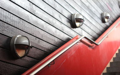 Lighting equipment on wooden wall at stairway