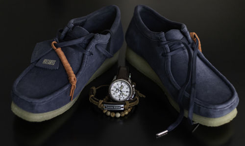 High angle view of shoes against black background