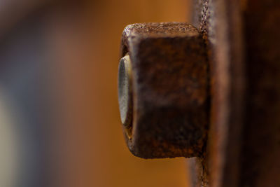 Extreme close-up of rusty metallic nut