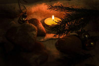 Close-up of illuminated christmas decorations on table