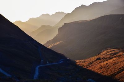 Scenic view of mountains against sky during sunset