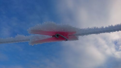 Low angle view of airplane flying in sky