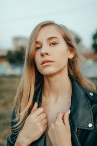 Portrait of young woman looking away