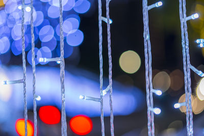 Close-up of illuminated lights at night