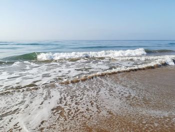 Scenic view of sea against clear sky