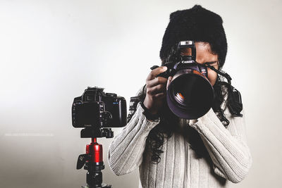 Man photographing camera