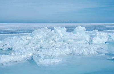 Scenic view of frozen sea against sky