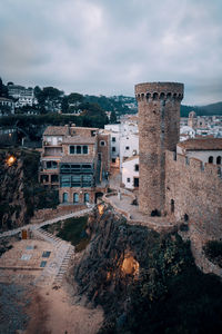 High angle view of tower and castle in old town