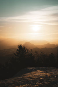 Scenic view of silhouette landscape against sky during sunset