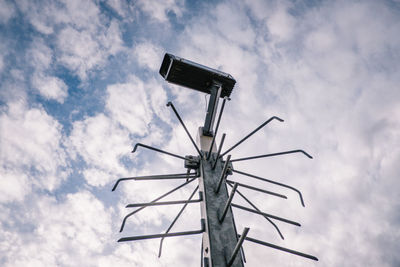 Low angle view of wind turbine against sky