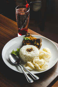 Close-up of food served on table