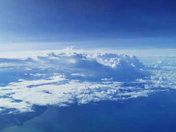 Aerial view of cloudscape against blue sky