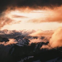 Scenic view of mountains against sky during sunset