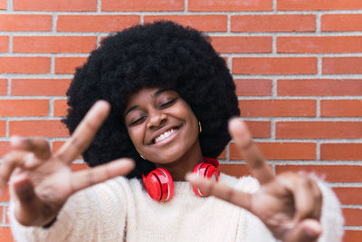 Portrait of young woman holding apple