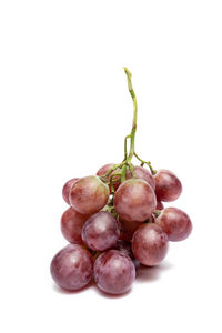 Close-up of grapes against white background