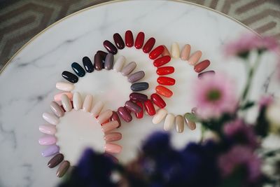 High angle view of pink flower on floor