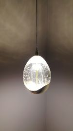 Close-up of illuminated light bulb