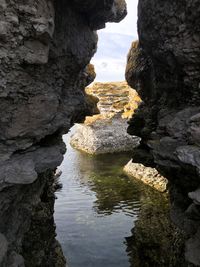 Scenic view of rock formation against sky