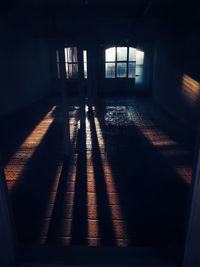 High angle view of sunlight falling on floor in building