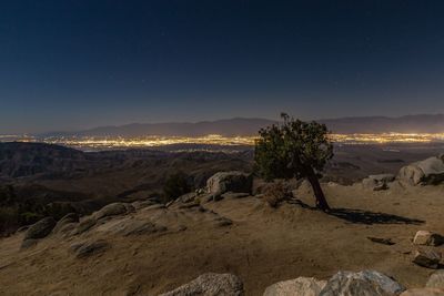 Scenic view of landscape at joshua tree national park during night