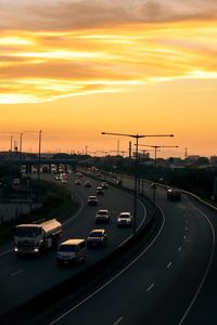 High angle view of traffic on road against sky during sunset