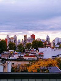 High angle view of buildings against sky during sunset