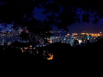 Illuminated cityscape at night